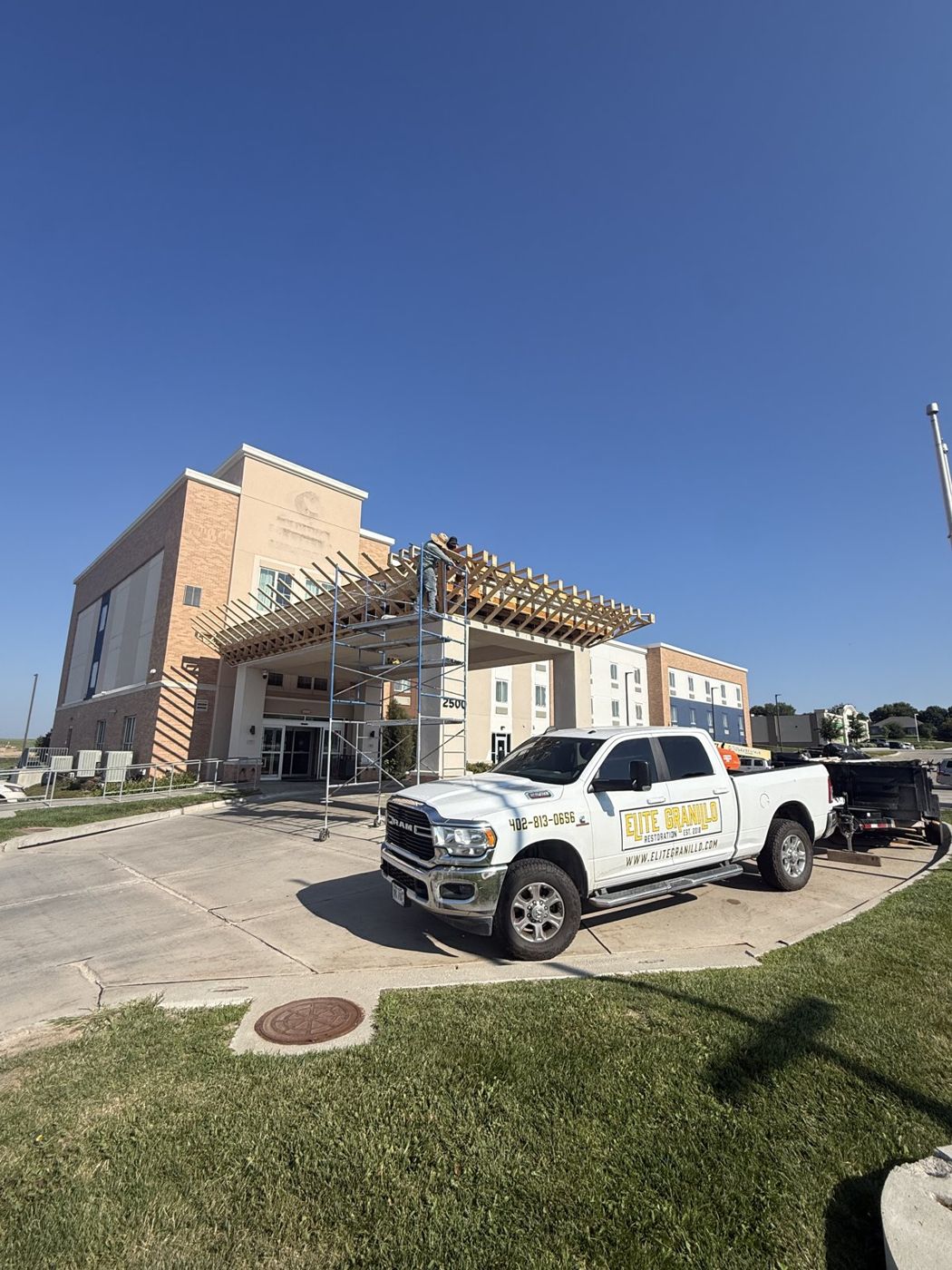 Elite Granillo Restoration crew on a hotel exterior project in the Omaha area