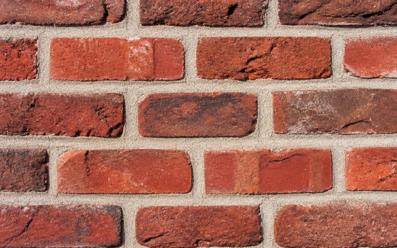 Tuckpointing Services — Repointing failing mortar joints on brick and stone.